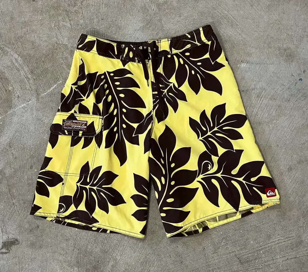 Y2K vintage Quiksilver Men's yellow Hawaiian Boardriding Floral Board Shorts 32”